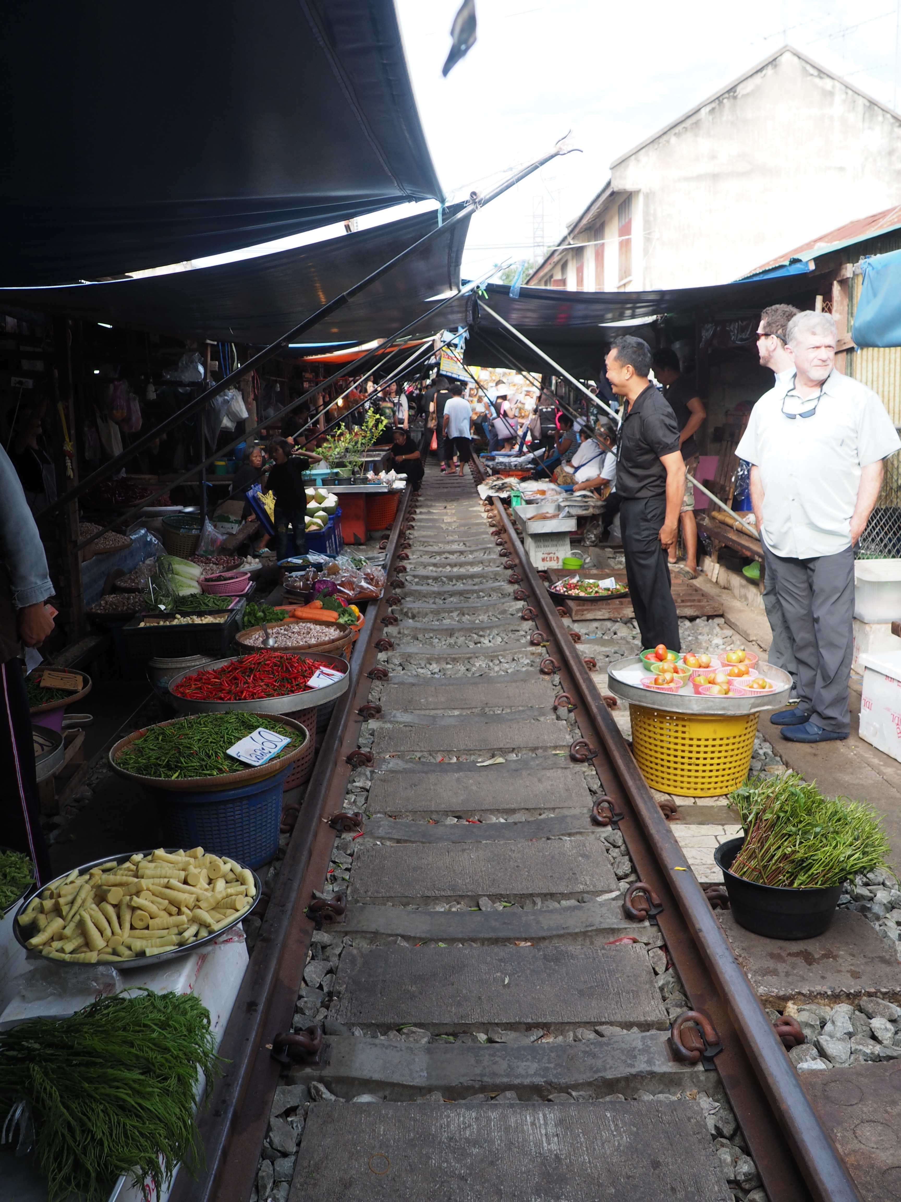 Thailand's Maeklong Railway Market: a market on an active railway travel | Shades of Pinck