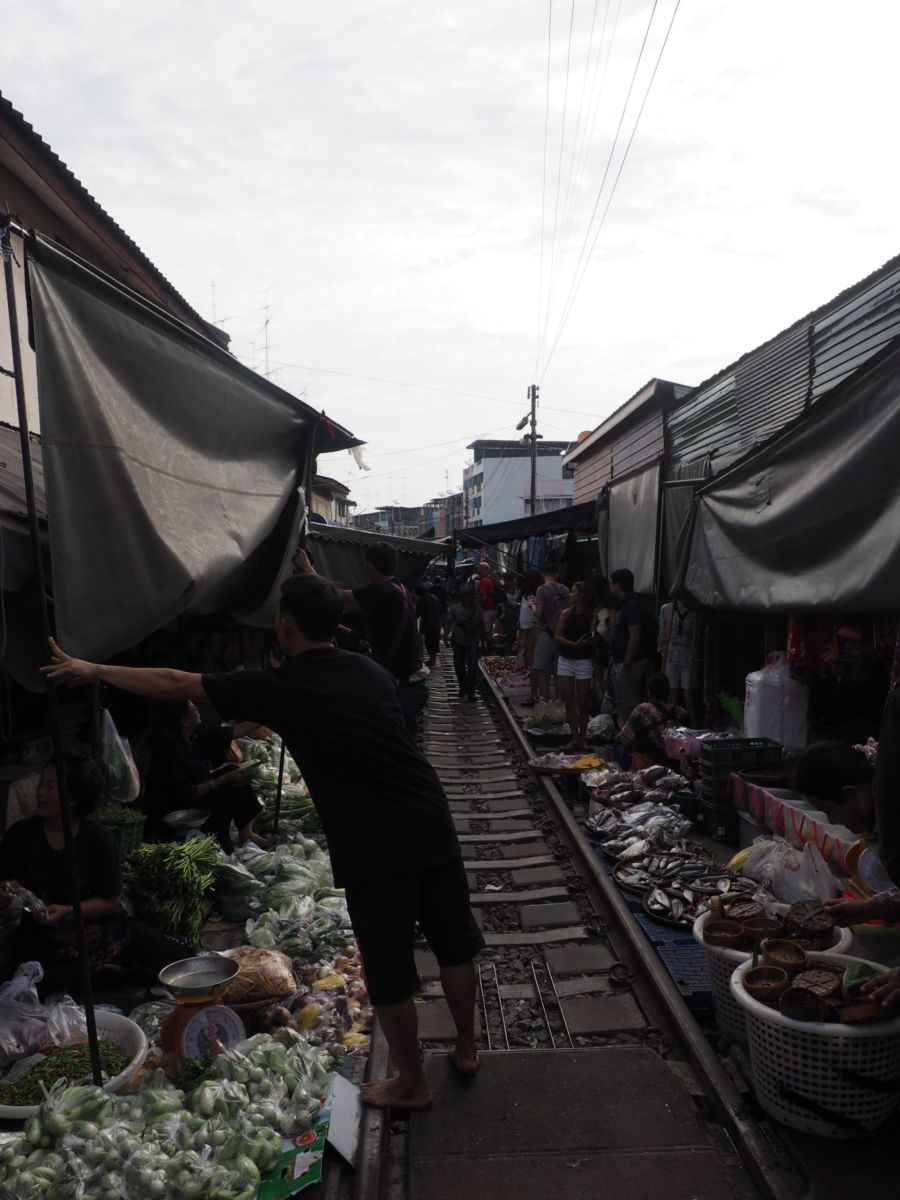 Thailand's Maeklong Railway Market: a market on an active railway travel | Shades of Pinck